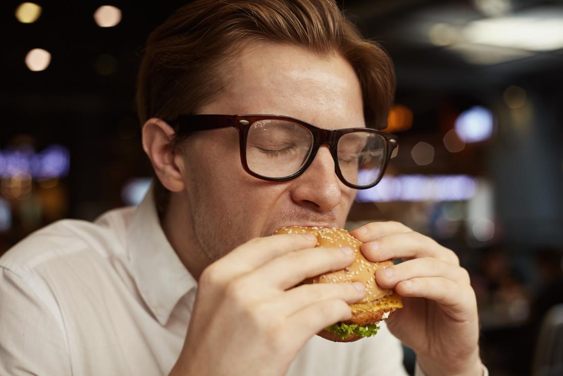 man-eating-hamburger